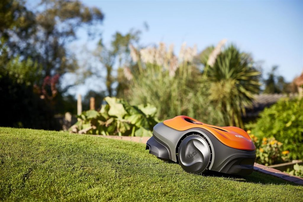 Flymo EasiLife GO 400 Robotic Lawn Mower for the perfect manicured lawn. Easy set-up and installation. Convenient app control. Quietly Safely cuts up to sqm, orange and grey, 400m2